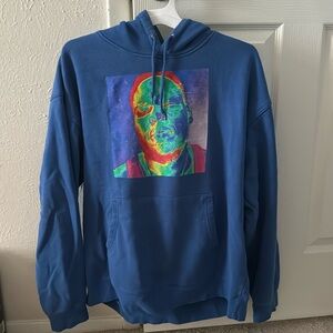 Pullover hoodie c rapper on front.